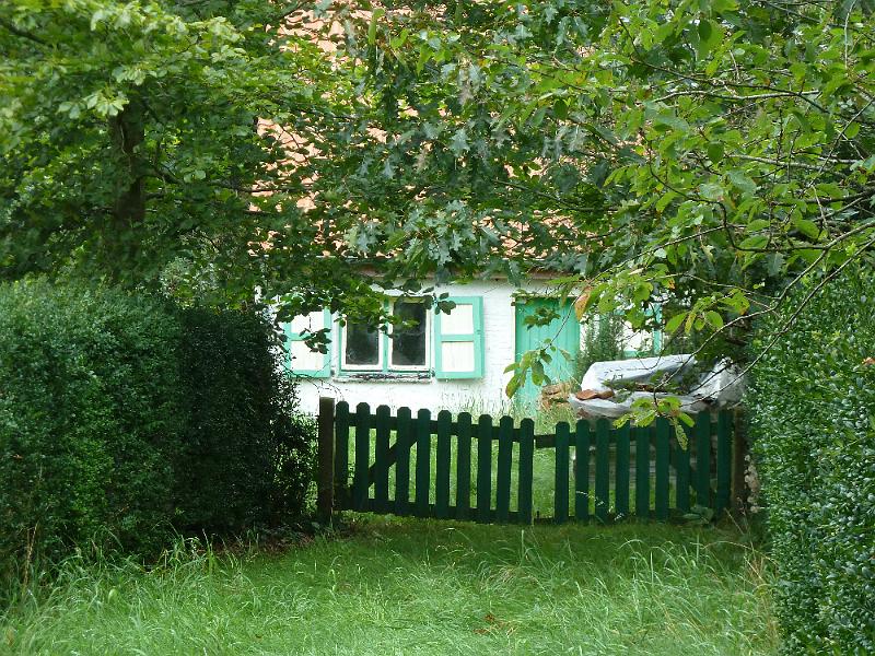 033dag2brugsommeland1.jpg - ook wel bescheidener woningen staan.